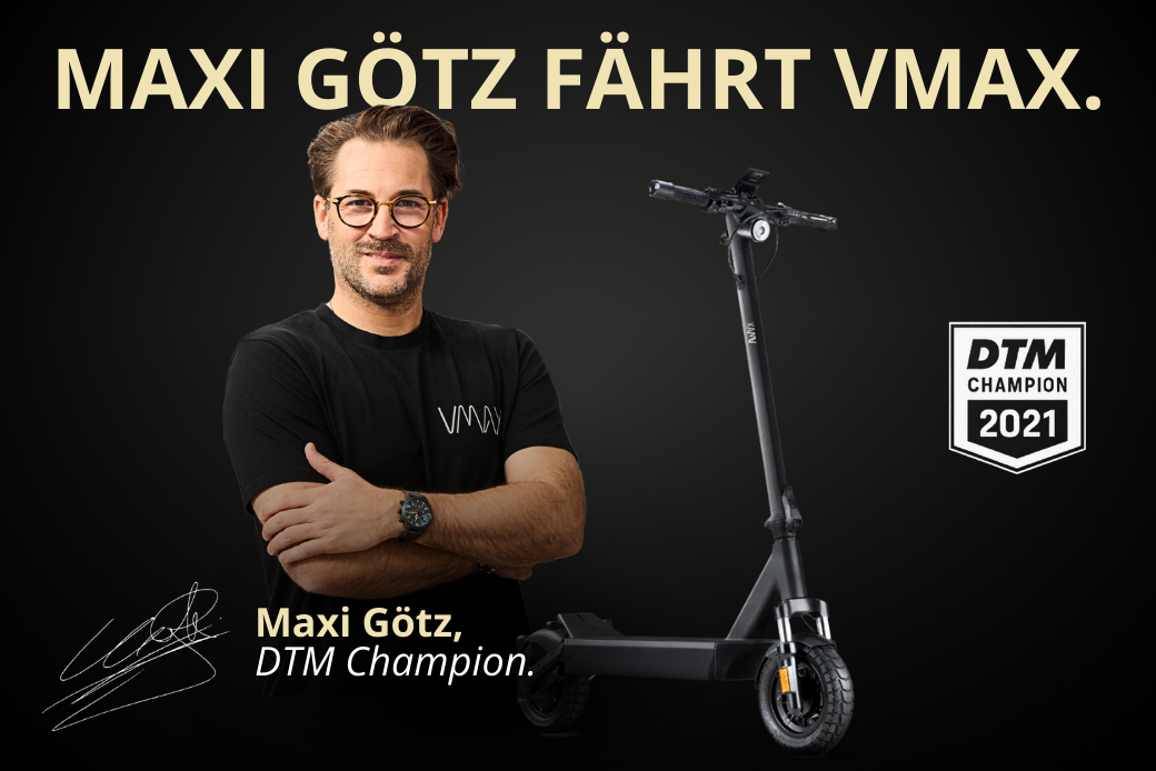 Ehemaliger DTM-Champion Maxi Götz neben einem VX4 VMAX E-Scooter